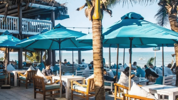 Relax at the bars and restaurants by the sea